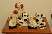TWO PAIR OF STAFFORDSHIRE DOGS