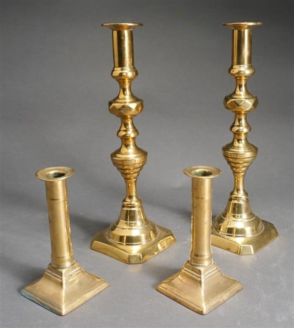 TWO PAIRS OF BRASS CANDLESTICKS,