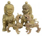 TWO PAIRS OF BRASS FOO DOGS TO