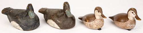 TWO PAIRS OF CARVED AND PAINTED