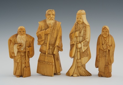 Two Pairs of Carved Ivory or Bone