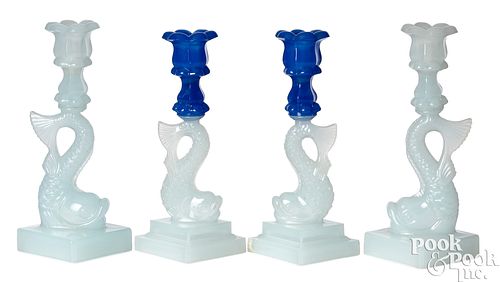 TWO PAIRS OF GLASS DOLPHIN