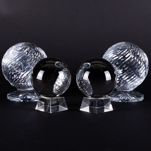 TWO PAIRS OF GLASS SPHERES ON