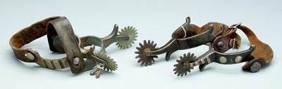 Two pairs of unmarked spurs: one