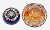 Two paperweights: one faceted,