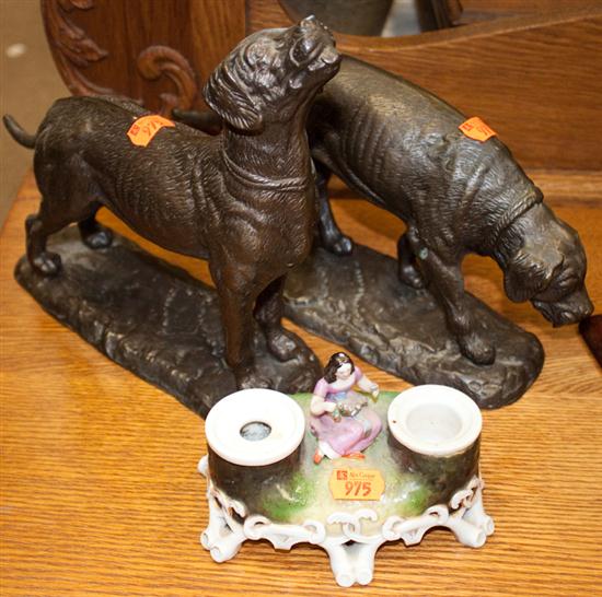 Two patinated bronze dog statues