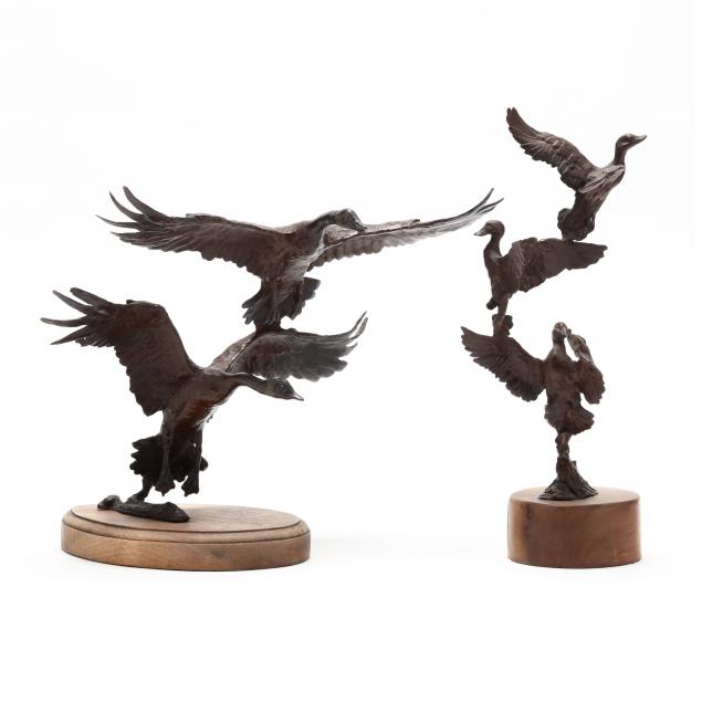 TWO PATINATED CAST BRONZE