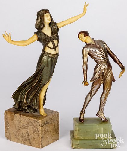 TWO PATINATED METAL AND CELLULOID