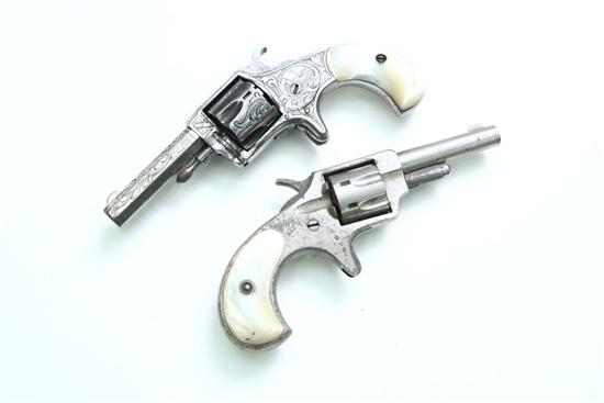 TWO PEARL HANDLED REVOLVERS.