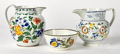 TWO PEARLWARE CREAMERS AND A