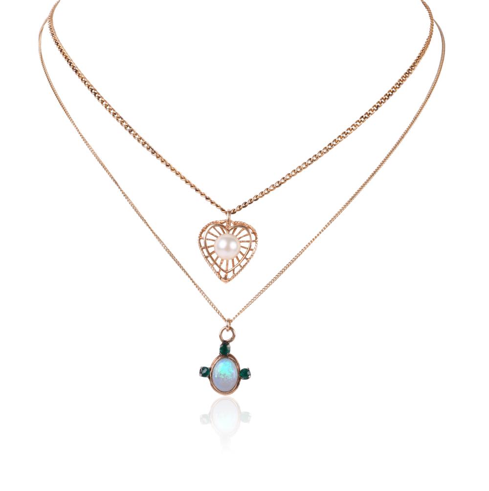TWO PENDANTS WITH GOLD CHAINS