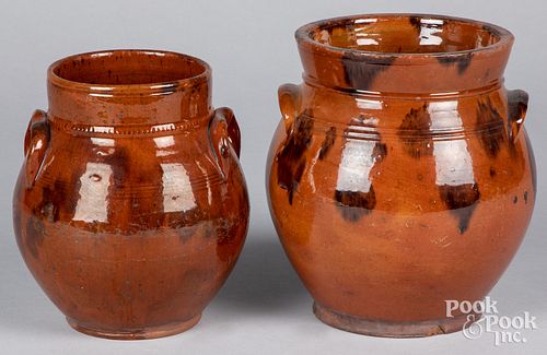 TWO PENNSYLVANIA REDWARE CROCKS,