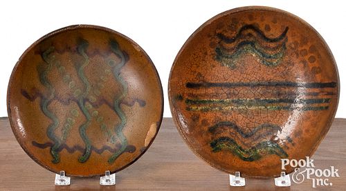TWO PENNSYLVANIA REDWARE PLATES,
