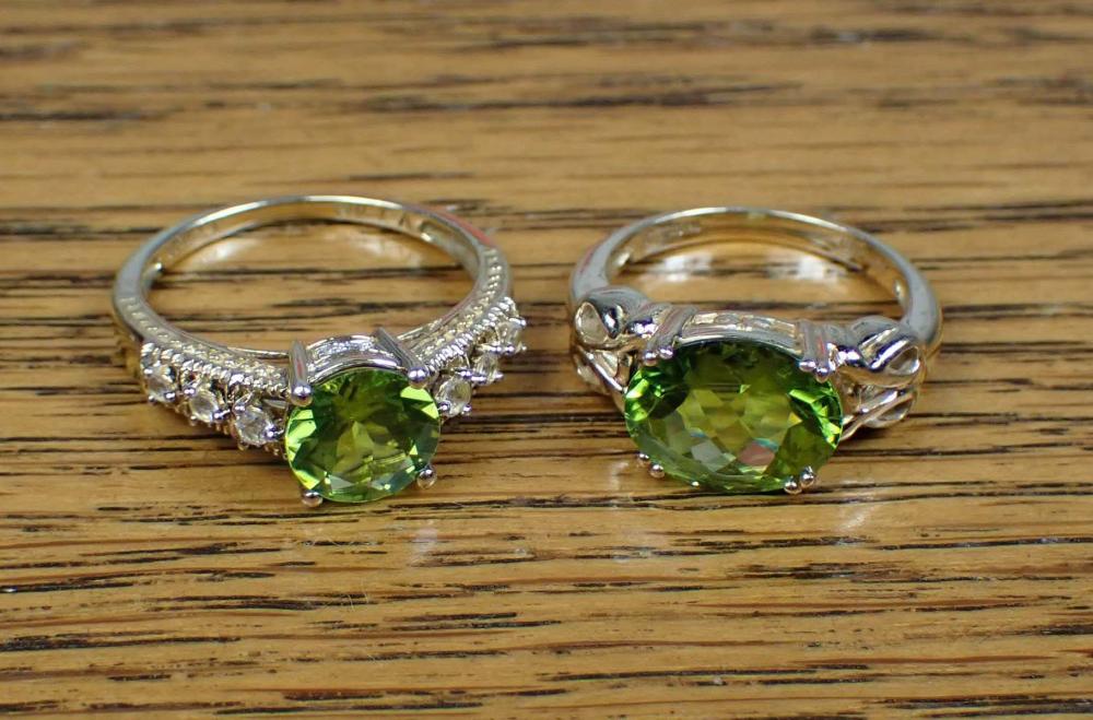 TWO PERIDOT AND YELLOW GOLD