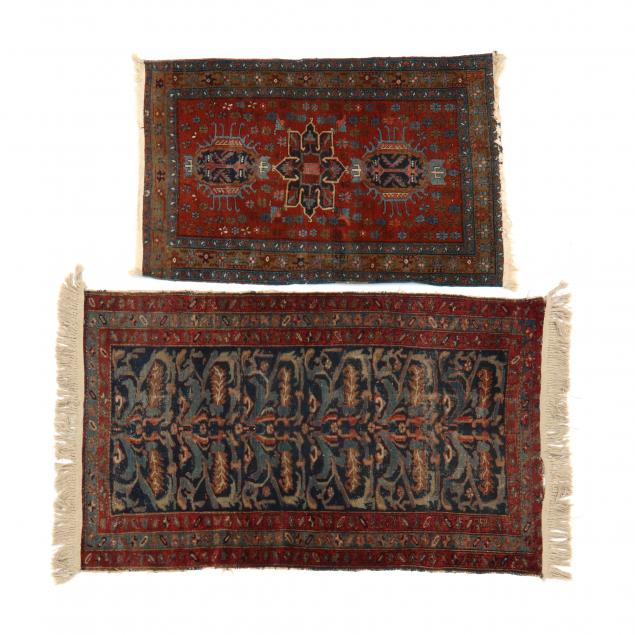 TWO PERSIAN AREA RUGS The first a