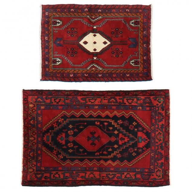 TWO PERSIAN RUGS The first a