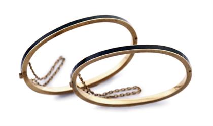 Two petite black enamel bangle
