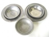 Two pewter deep dishes and thr