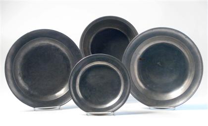 Two pewter deep dishes, plate and