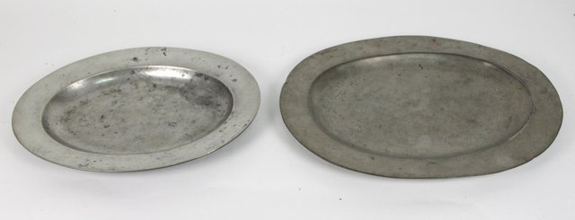 Two pewter oval platters each