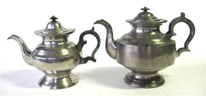 Two pewter teapots    daniel