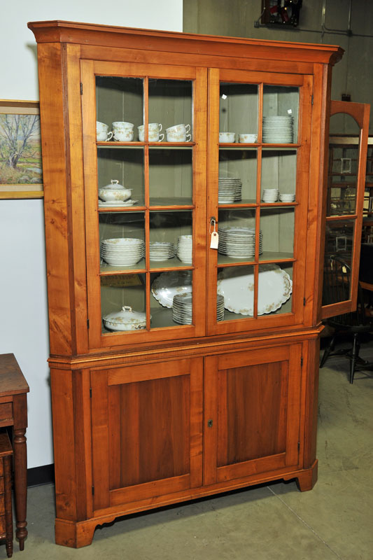 TWO PIECE CORNER CUPBOARD. Cherry