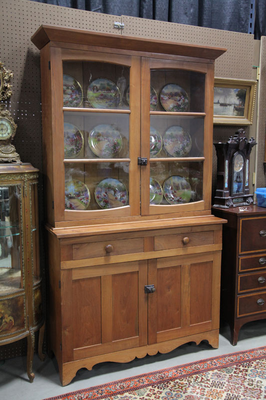 TWO PIECE STEPBACK CUPBOARD. Walnut
