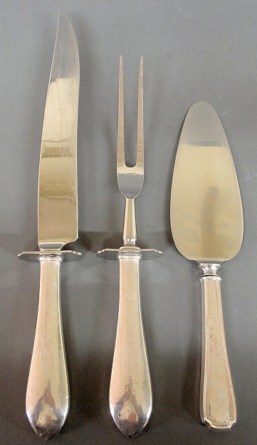 Two-piece sterling silver carving