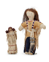 TWO PLAINS BEADED HIDE DOLLS<b