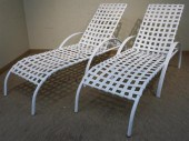 TWO PLASTIC CHAISE LOUNGES, 69