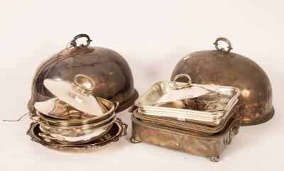 Two plated dish covers with