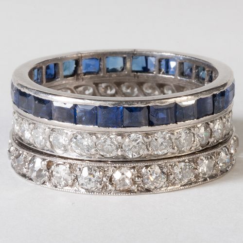 TWO PLATINUM AND DIAMOND BAND RINGS