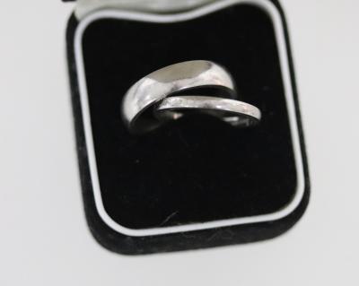 Two platinum wedding bands,