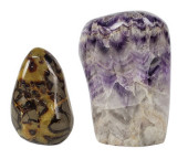 TWO POLISHED STONE BOULDERS, 8