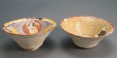 TWO POLYCHROME DECORATED POTTE