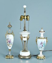 Two porcelain, one marble urns