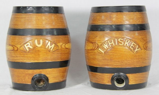 Two pottery spirit barrels Rum