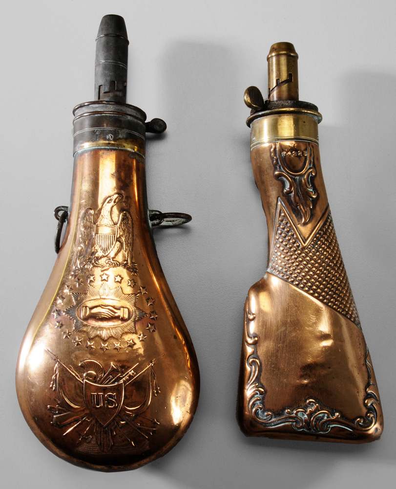Two Powder Flasks one gunstock