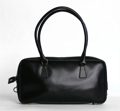 Two Prada handbags    One small