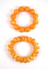 TWO PRESSED BALTIC AMBER STRET