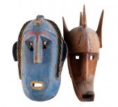 TWO PRIMITIVE CARVED WOOD MASK