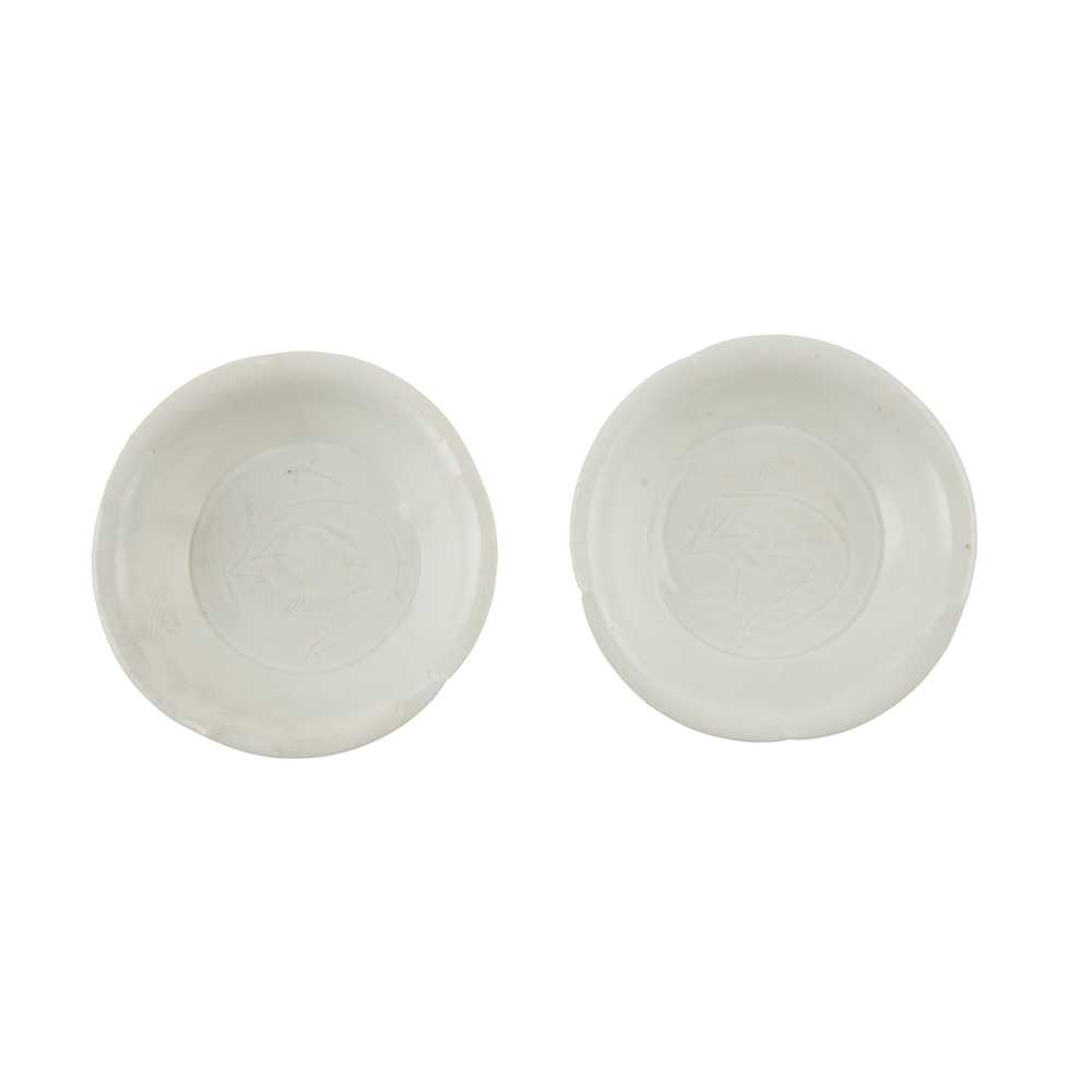 TWO QINGBAI BARBED-RIM DISHES