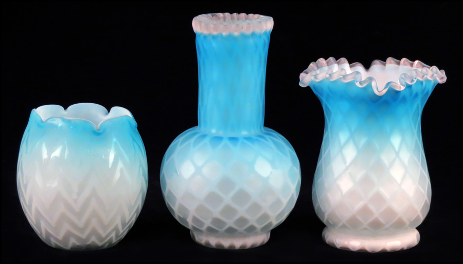 TWO QUILTED SATIN GLASS VASES. Both