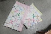 TWO QUILTS. A crib size cotton