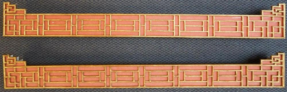 TWO RED PAINTED AND GILT ASIAN