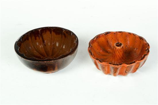 TWO REDWARE FOOD MOLDS. 