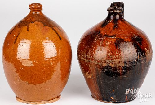 TWO REDWARE JUGS, 19TH C.Two