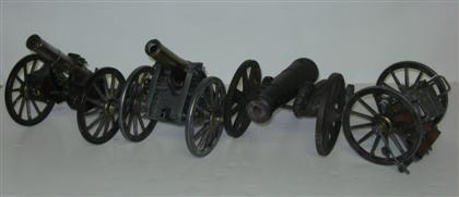 Two replica brass and base metal