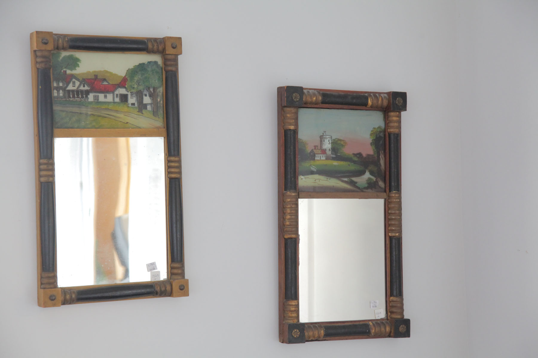 TWO REVERSE PAINTED MIRRORS. 