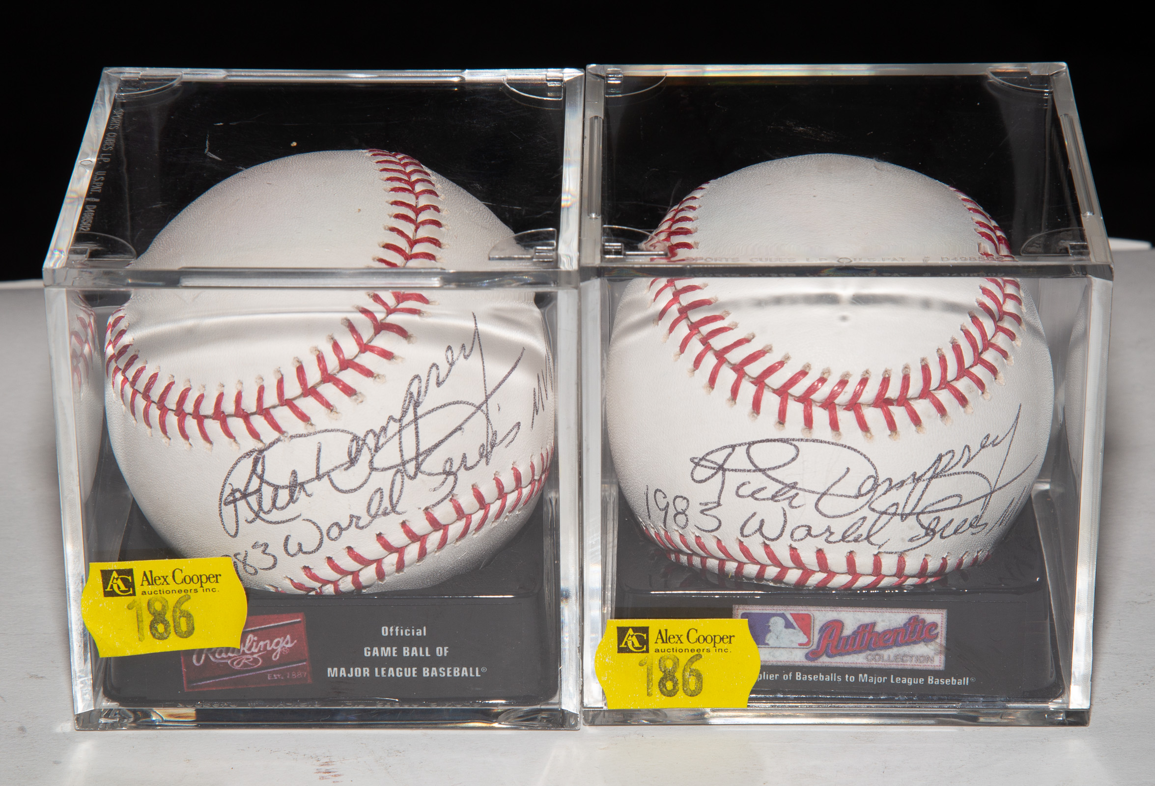 TWO RICK DEMPSEY SIGNED RAWLINGS